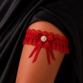 czerwone podwiązki na studniówkę bridal stole.jpg